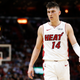 Tyler Herro #14 of the Miami Heat looks on against the Memphis Grizzlies during the first half at American Airlines Arena on October 23, 2019 in Miami, Florida.